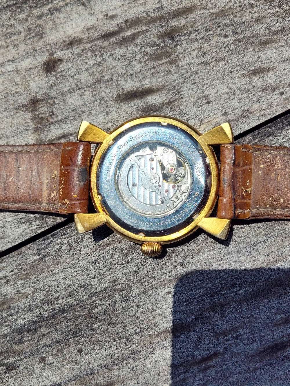 Men's Gold Tone Case With Brown Leather Strap with Open Heart Dial. 27 Jewels